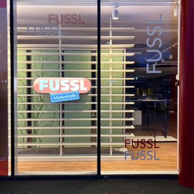 Fussl Stockerau Leuchtschild Folien Schaufenstser